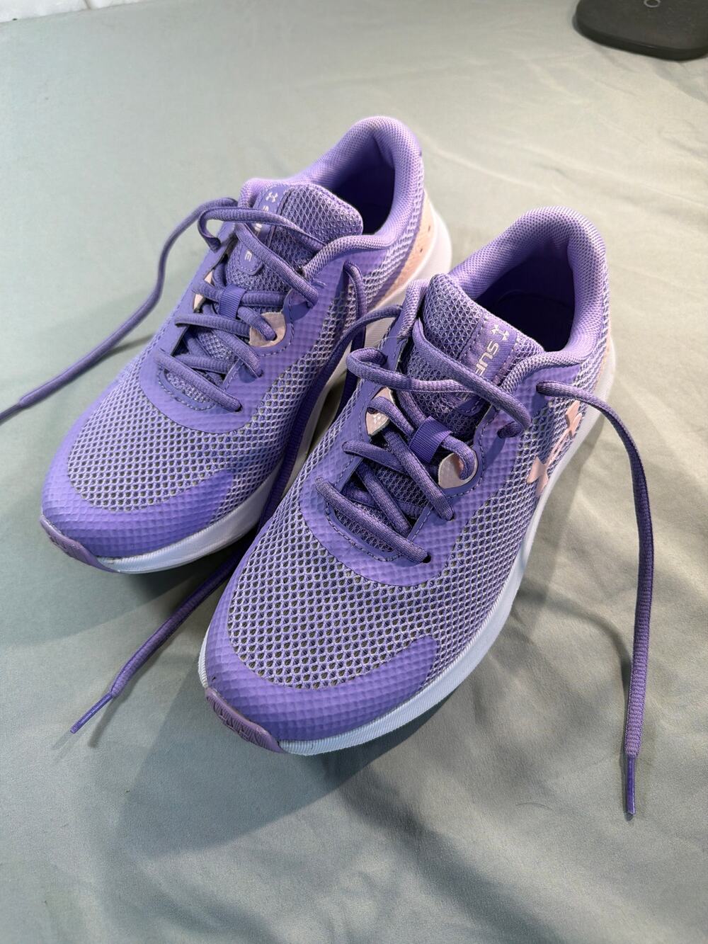 Under Armour Purple and Pink Kids Surge 3 running shoes size 5.5Y